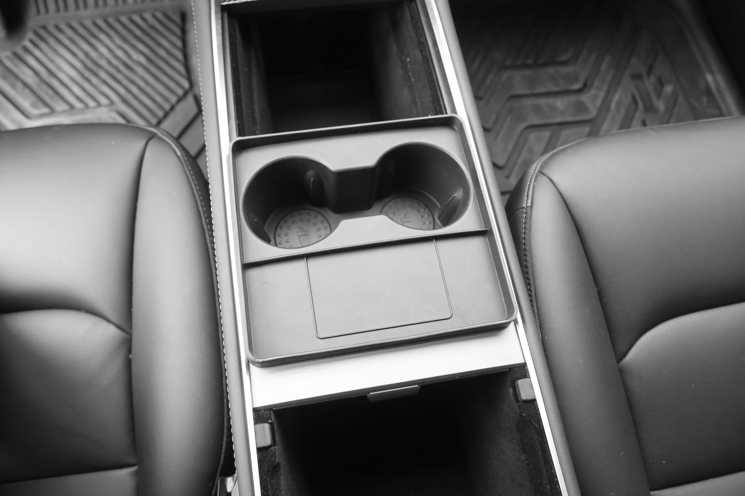 An overhead view of the interior of the Tesla Y Cup Holder Accessory installed